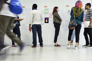 Group of diverse people attending startup business course © Freepik