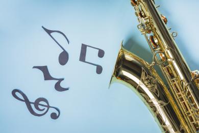 golden-saxophones-with-musical-notes-blue-background golden-saxophones-with-musical-notes-blue-background
