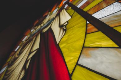 Close up of stained glass image of St.Thomas